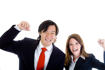 Image showing Asian Business Man and White Woman Pumping Fists in Air