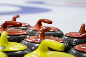 Image showing Group of Granite Curling Stones In an Ice Rink        