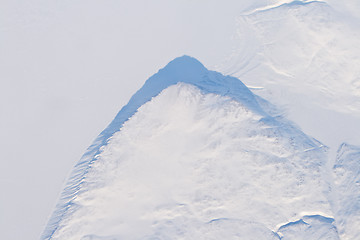 Image showing Aerial View Snow and Ice Covered Cliff Baffin Island, Canada 