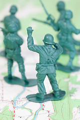 Image showing Plastic Army Men Fighting Topographic Map Leader