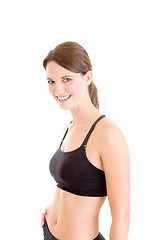 Image showing Slender Caucasian Woman in Sports Bra Smiling White Background