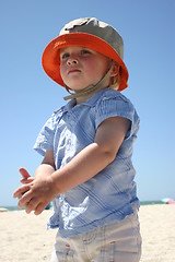 Image showing Blonde boy playing on the beach