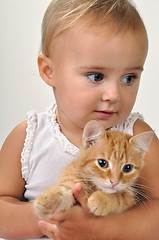 Image showing cute child with a cat