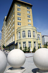 Image showing Hotel with three large sphere sculptures in foreground