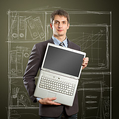 Image showing businessman with open laptop in his hands