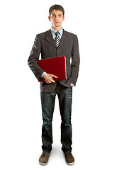 Image showing male in suit with laptop in his hands