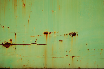 Image showing Green tin rusty wall