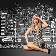 Image showing young businesswoman looking forward