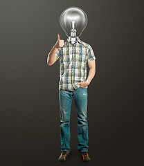 Image showing full length man with lamp shows well done