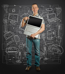 Image showing man with open laptop in his hands