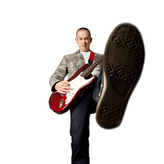 Image showing rocker with guitar and foot
