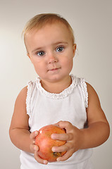 Image showing baby with an apple