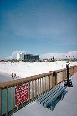 Image showing Boardwalk, bench, and sign at the beach