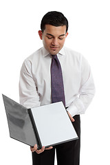 Image showing Businessman or waiter holding a brochure or menu