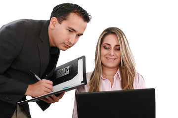 Image showing A man and woman business team at their company office