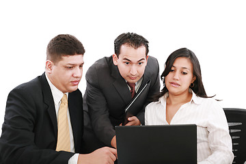 Image showing business team looking shocked and worried when looking at the la