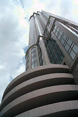 Image showing Low angle wide perspective of tall office building