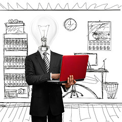 Image showing lamp head businessman with laptop