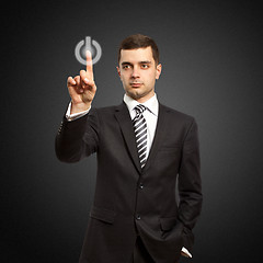 Image showing businessman push the button