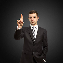 Image showing businessman push the button