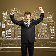 Image showing businessman with hands up