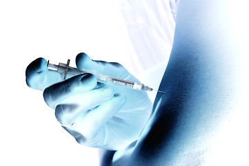 Image showing Shaded injection insulin pen at hand