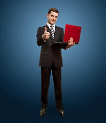 Image showing businessman with laptop shows well done