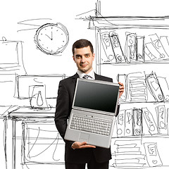 Image showing businessman with open laptop in his hands