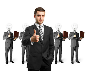 Image showing lamp head business people with laptops