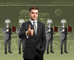 Image showing lamp head business people with laptops