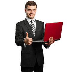 Image showing male in suit with laptop in his hands