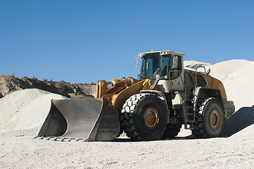 Image showing Excavator in a limestone quarry