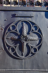 Image showing Old metal gate decorations. Retro architecture.
