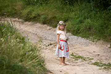 Image showing little girl standing on the road