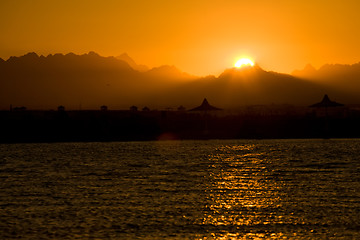 Image showing seascape with orange sunset