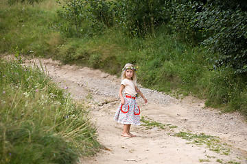 Image showing little girl standing on the road