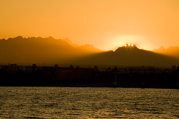 Image showing seascape with orange sunrise