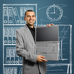 Image showing businessman with open laptop in his hands