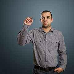 Image showing businessman writing something