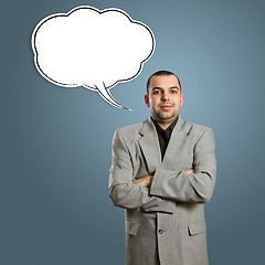 Image showing male in suit with crossed hands and speech bubble
