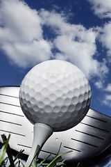 Image showing Golf club and ball in grass