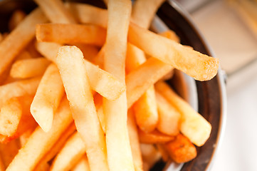 Image showing fresh french fries on a bucket