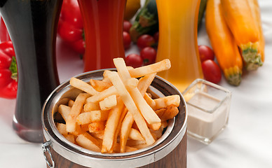 Image showing fresh french fries on a bucket