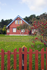 Image showing Homestead house with a large yard and garden.