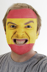 Image showing Face of crazy angry man painted in colors of Spain flag