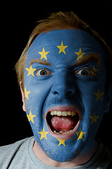 Image showing Face of crazy angry man painted in colors of europe flag