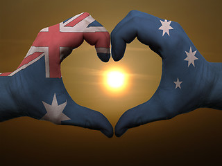 Image showing Heart and love gesture by hands colored in australia flag during