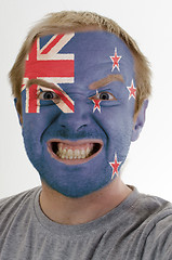 Image showing Face of crazy angry man painted in colors of new zealand flag