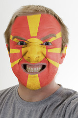 Image showing Face of crazy angry man painted in colors of macedonia flag