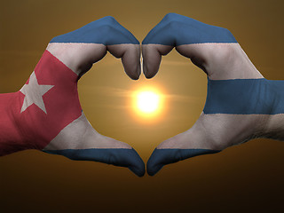 Image showing Heart and love gesture by hands colored in cuba flag during beau